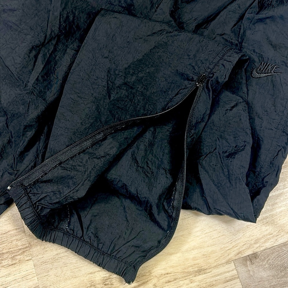 Vintage Nike Black Embroidered Logo Zippered Leg Nylon Windbreaker Track Pants S